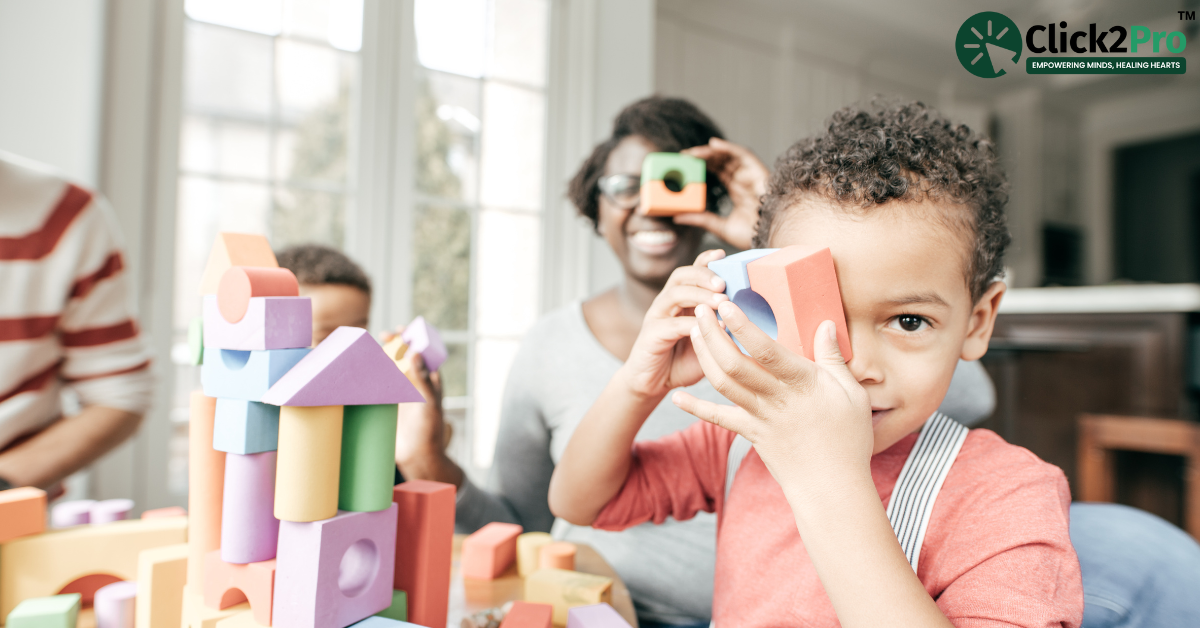 Child engaging in play therapy with colorful blocks to promote mental well-being at Click2Pro.