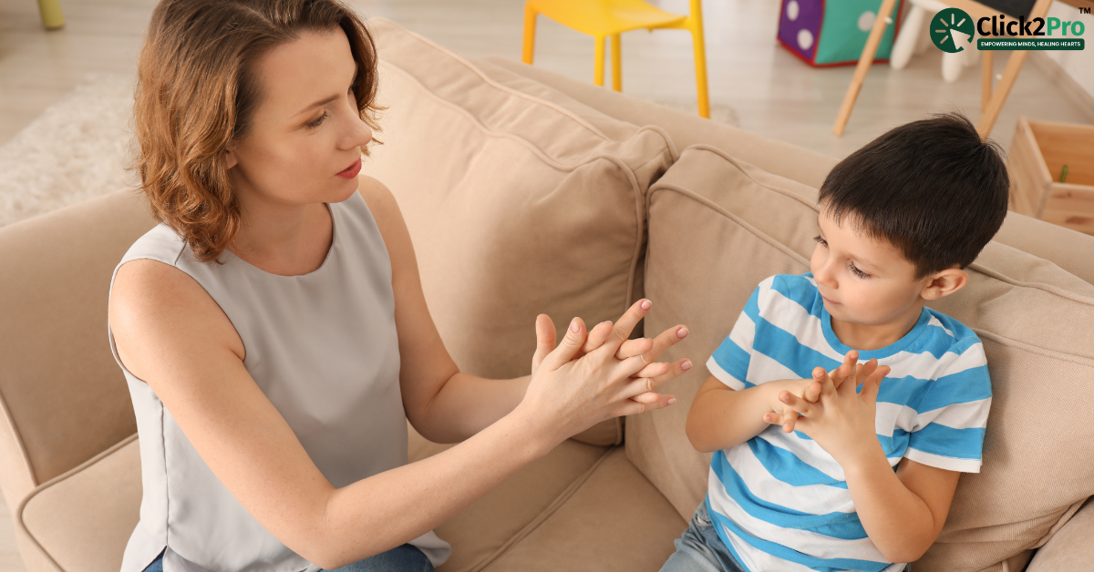 Counsellor using hand gestures to engage with a child during therapy for Reactive Attachment Disorder (RAD)