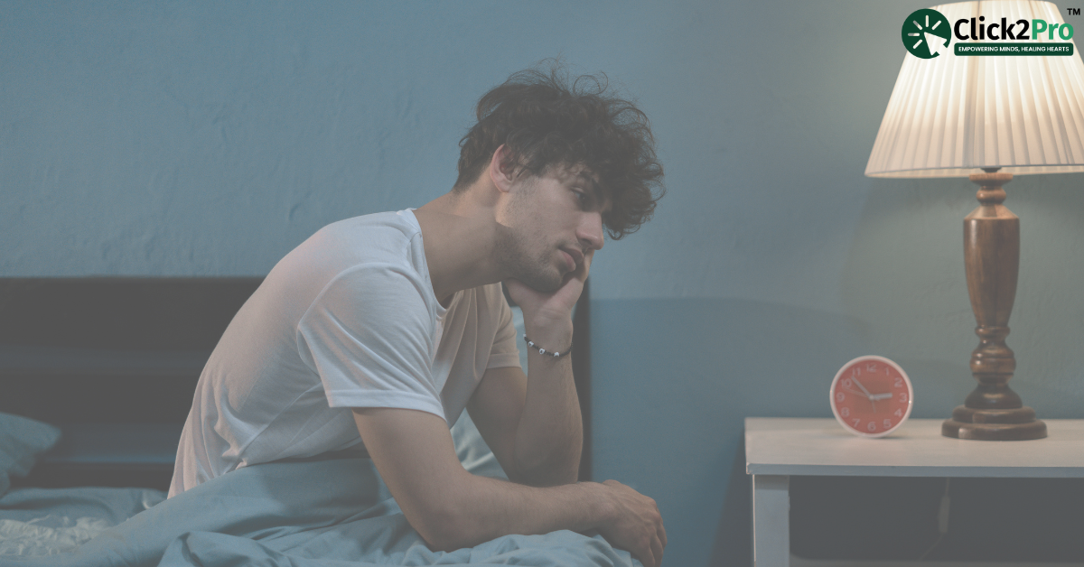 Man feeling stressed and overwhelmed in bed, reflecting on emotional challenges.