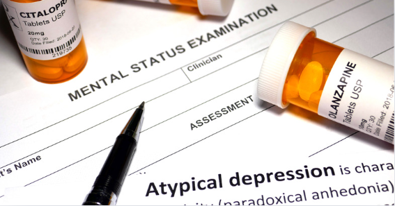 Image of mental status examination with medication bottles for atypical depression diagnosis and treatment