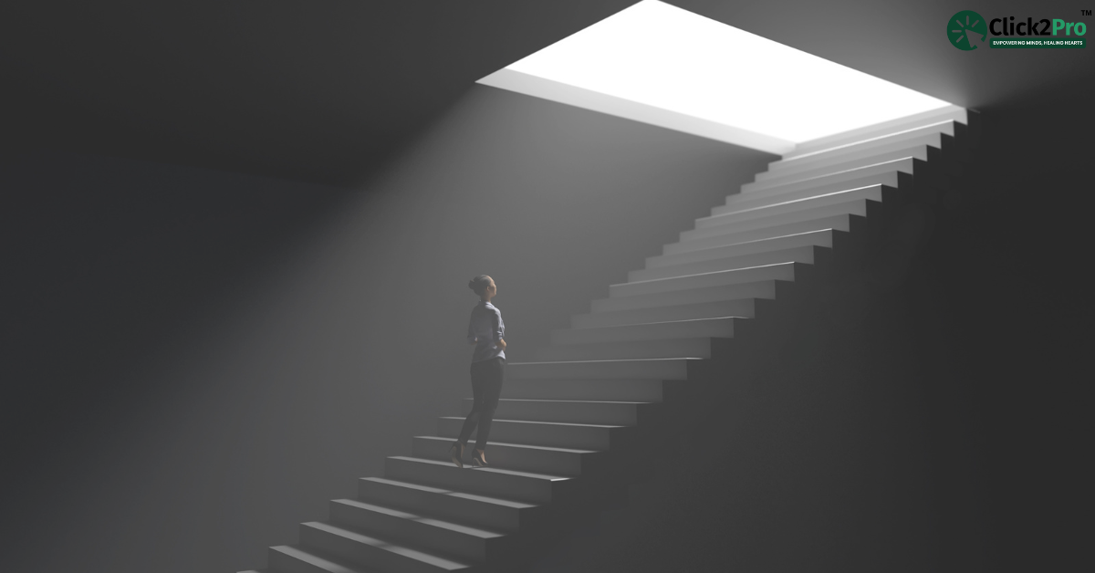 Woman climbing stairs toward light symbolizing hope and recovery from postpartum psychosis.