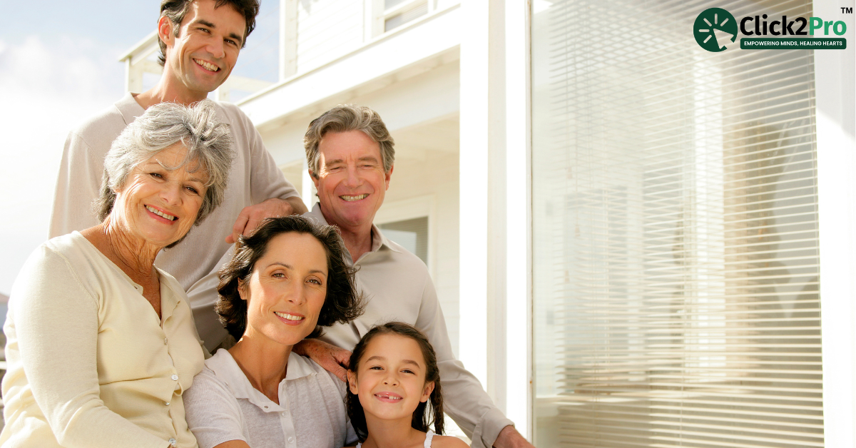 Happy multigenerational family smiling together outdoors, showcasing unity and harmony after family therapy.