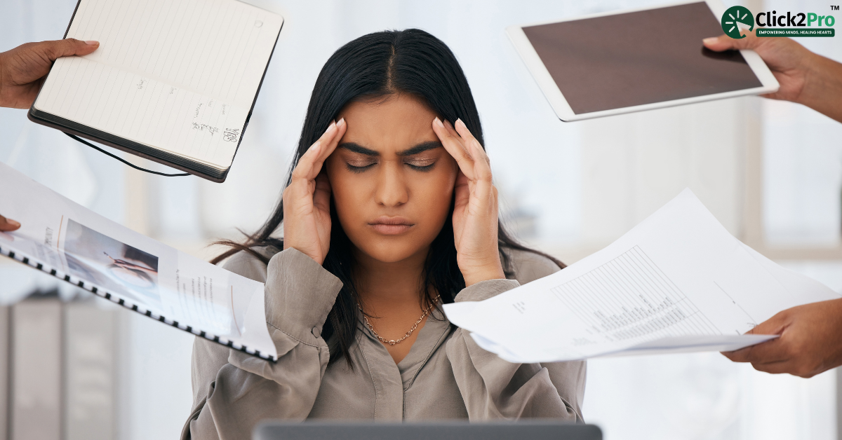 Woman overwhelmed with work stress, holding her head as multiple tasks are handed to her in an office.