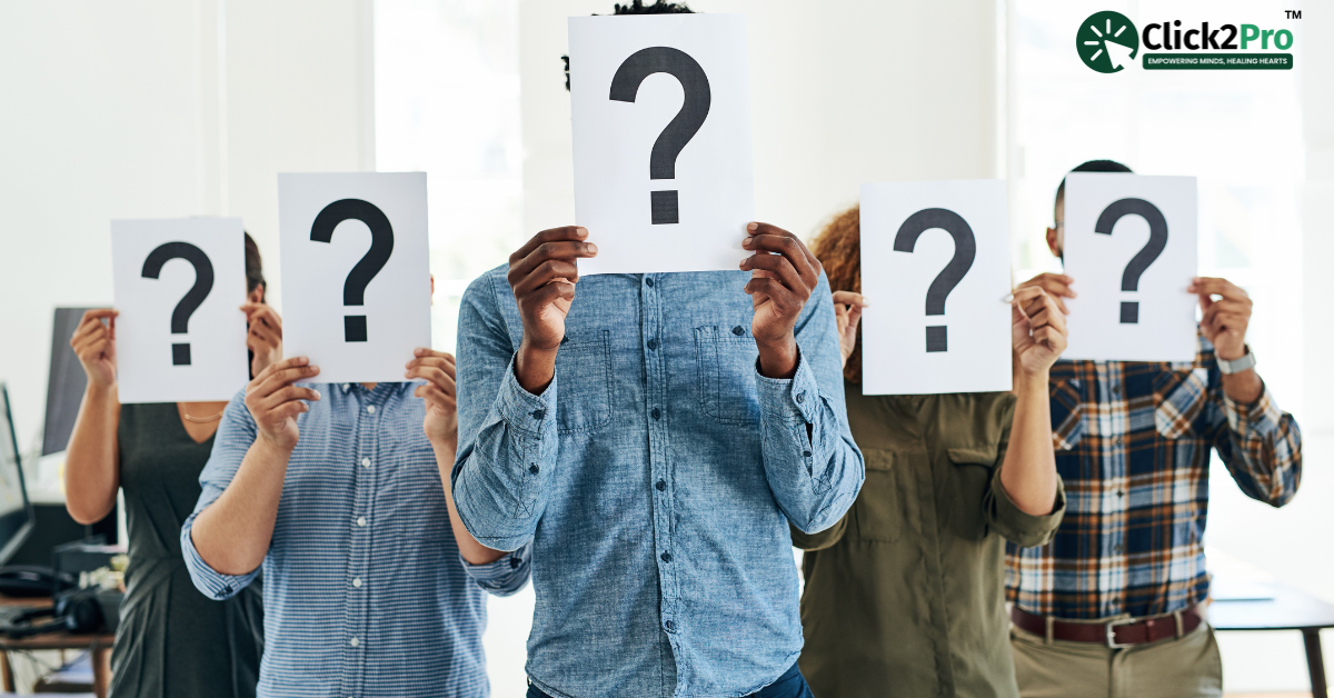 Group of professionals holding question mark signs in front of faces, representing workplace stress and its impact on productivity, with Click2Pro logo in the corner.