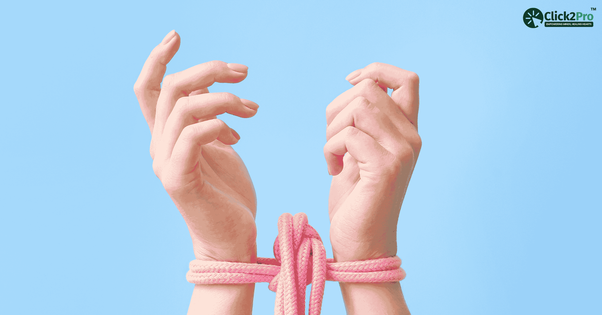 Hands tied with pink rope symbolizing psychological masochism, self-defeating behavior, and trauma.