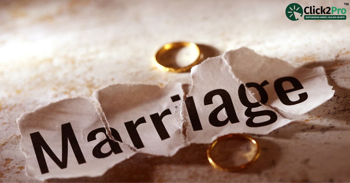 Marriage affected by financial decisions, symbolized by torn paper and wedding rings - Click2Pro