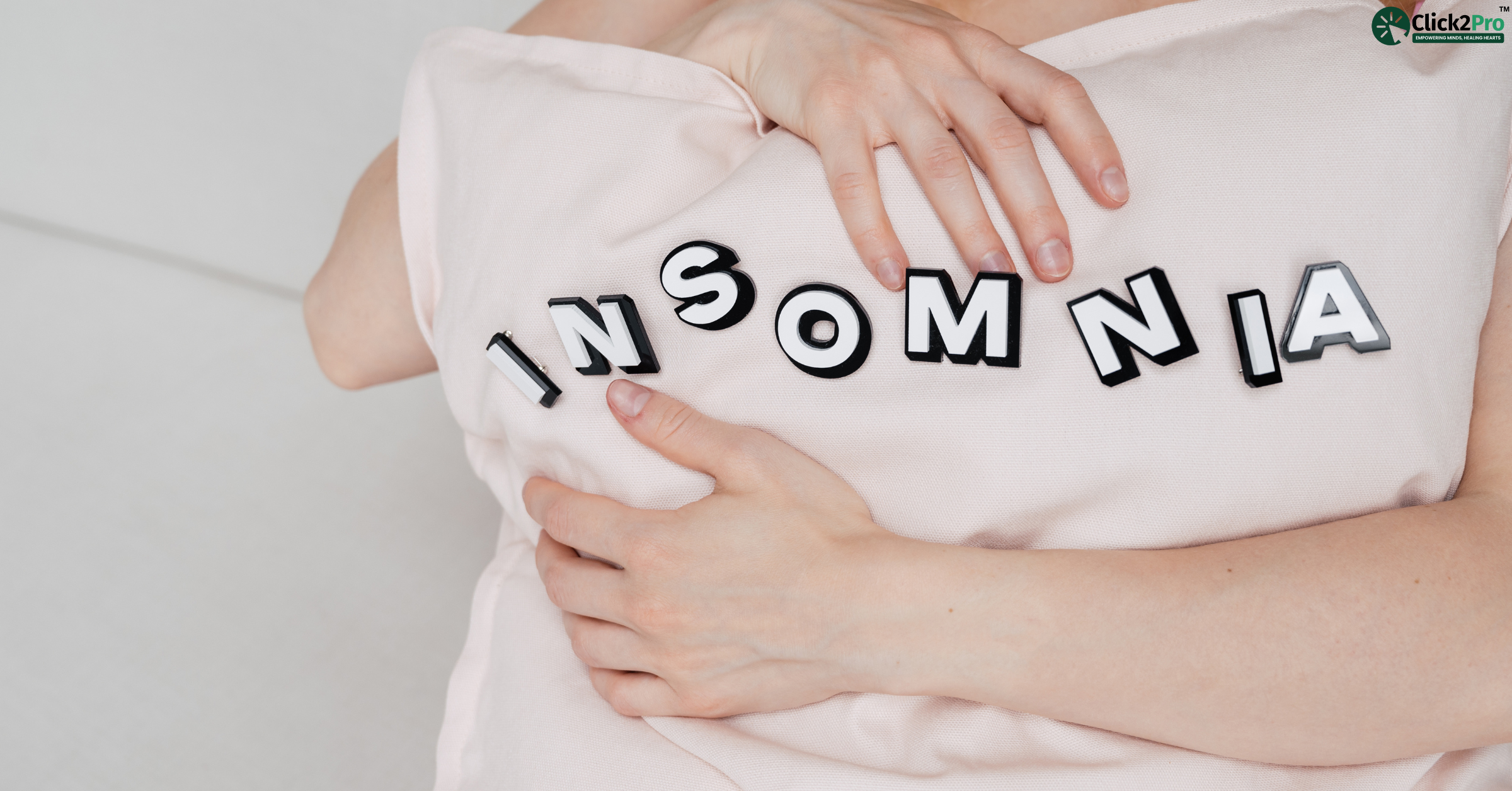 Person hugging a pillow with the word 'Insomnia' symbolizing sleep struggles and sleep disorders.