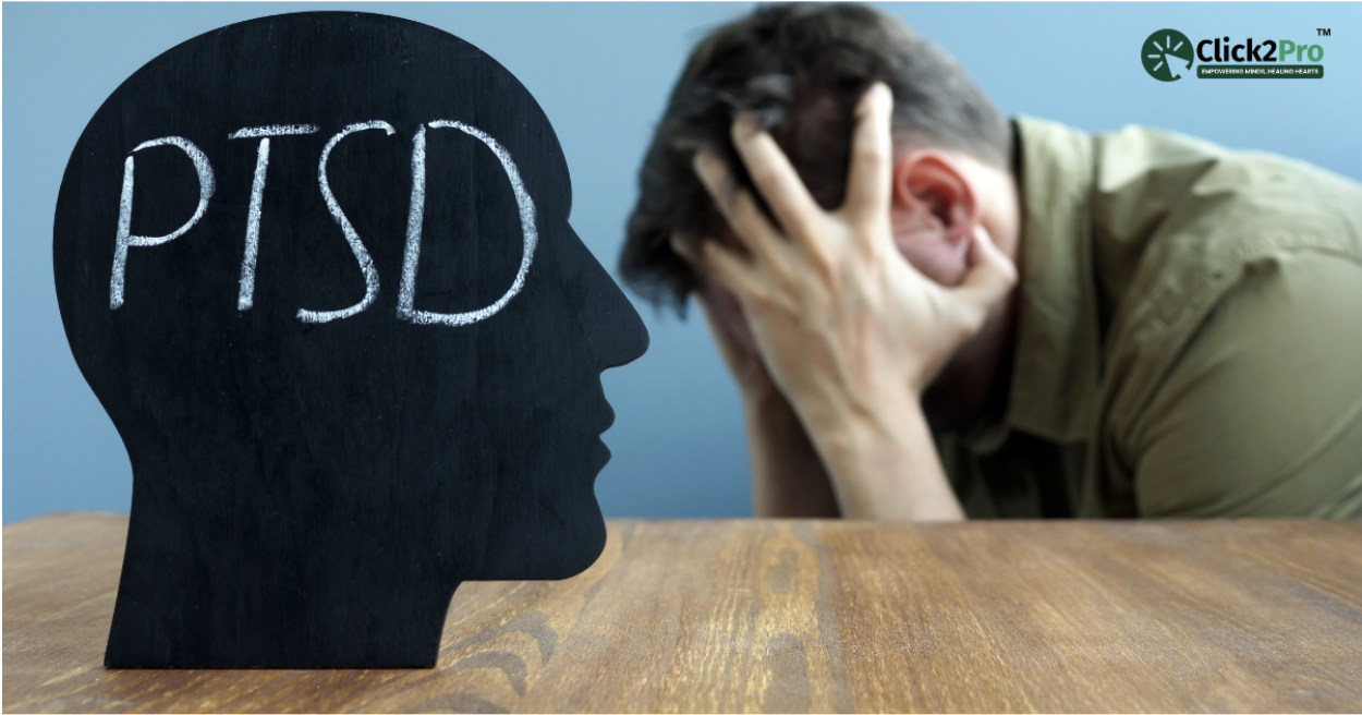 Man struggling with PTSD, holding head in distress, symbolizing Complex PTSD challenges.