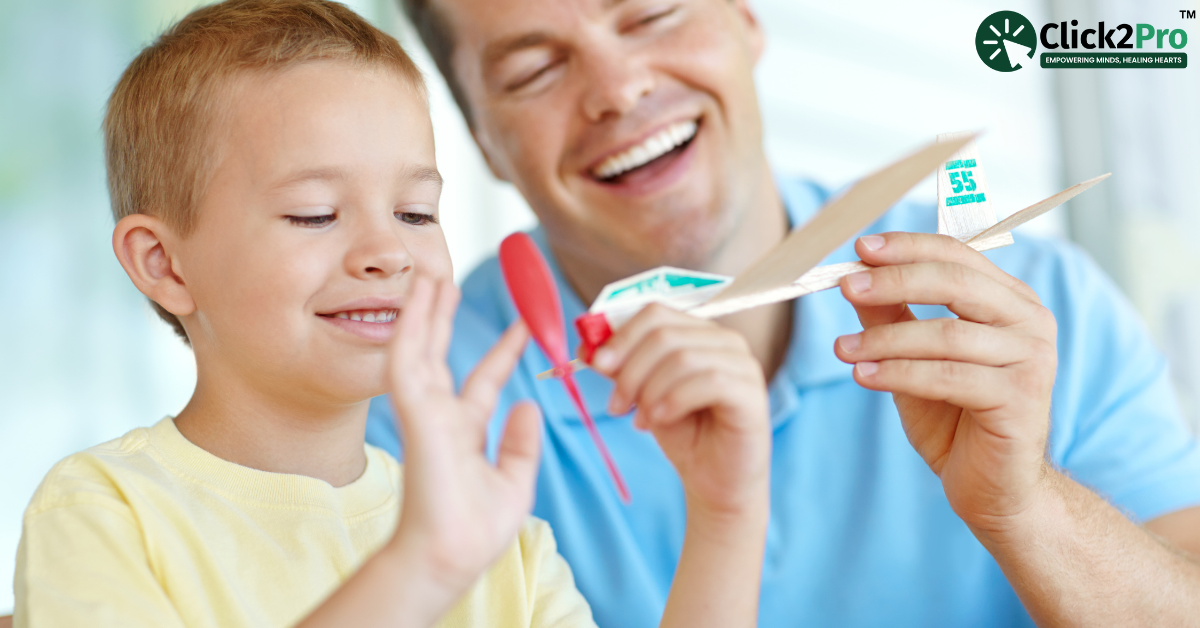 Father bonding with son using a wooden plane, highlighting positive attachment in parenting.