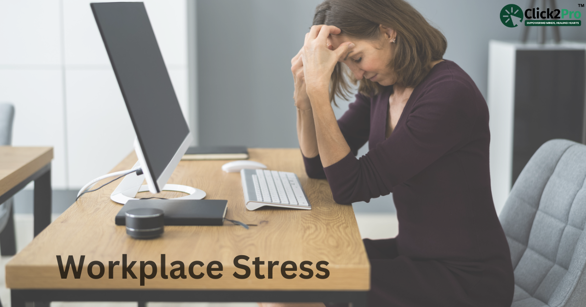 Stressed woman at desk struggling with workplace pressure, highlighting need for stress solutions.